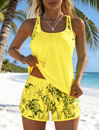 Barbara™ Elegant Ocean Print Split Tankini swimsuit from THE WHITMORE FAMILY, featuring a stylish blue ocean-themed design.