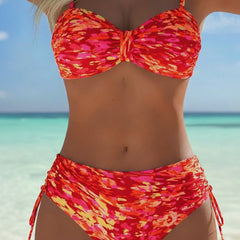 Audrey™ bikini strap swimsuit with colorful abstract pattern printed by THE WHITMORE FAMILY, featuring multicolor design and adjustable straps.