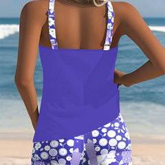 Purple Nina™ fashionable swimwear set by THE WHITMORE FAMILY, stylish swimsuits for women with a vibrant design.