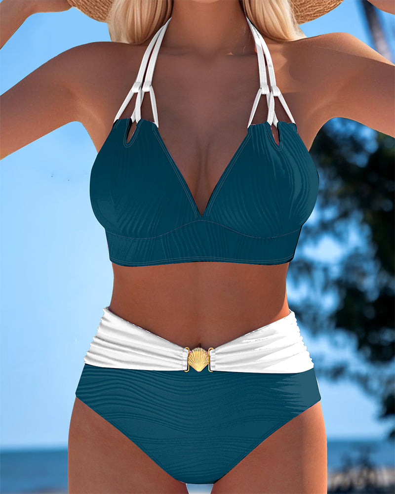 Lily™ high-waisted double strap swimsuit by THE WHITMORE FAMILY with contrast color, white and stylish design, on a model.