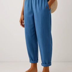 Romina™ Timeless linen-cotton trousers by THE WHITMORE FAMILY, shown in a casual fit with natural fabric texture and neutral color.