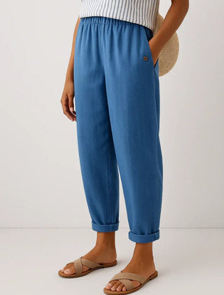 Romina™ Timeless linen-cotton trousers by THE WHITMORE FAMILY, shown in a casual fit with natural fabric texture and neutral color.