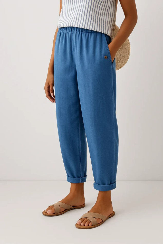 Romina™ Timeless linen-cotton trousers by THE WHITMORE FAMILY, shown in a casual fit with natural fabric texture and neutral color.