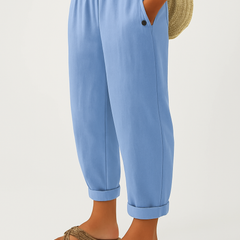 Sharona Lichtblauw Romina™ linen-cotton trousers from THE WHITMORE FAMILY, showcasing relaxed fit and lightweight fabric.