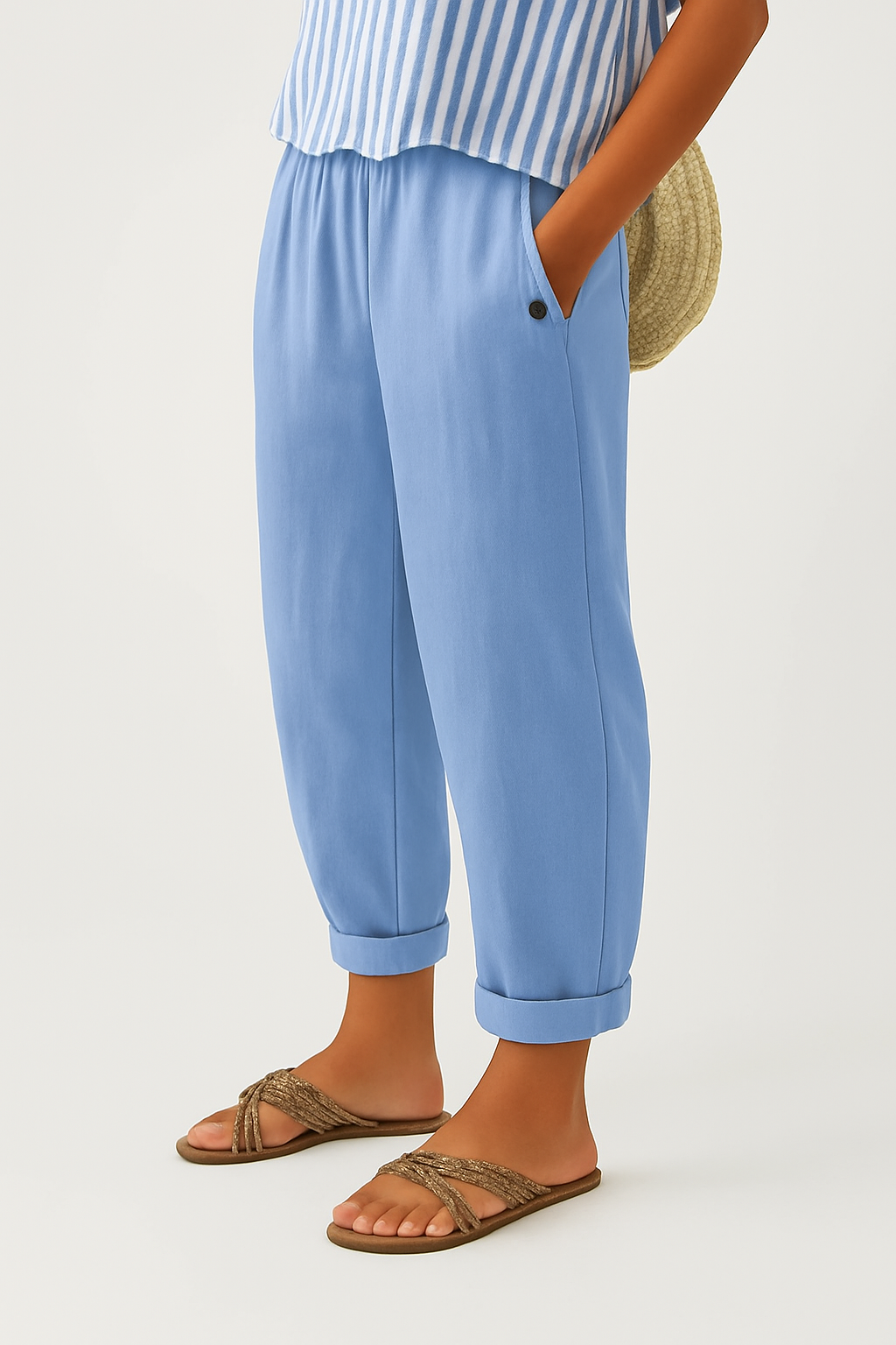 Sharona Lichtblauw Romina™ linen-cotton trousers from THE WHITMORE FAMILY, showcasing relaxed fit and lightweight fabric.