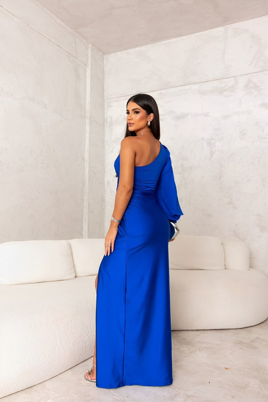 Turquoise stylish elegant dress by THE WHITMORE FAMILY, featuring a fitted silhouette and intricate detailing for a sophisticated look.