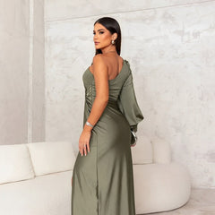 Turquoise Grace stylish elegant dress by THE WHITMORE FAMILY, showcasing a flowing design and refined fabric.