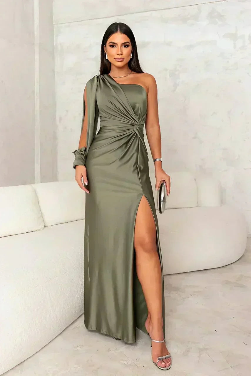 Turquoise Riley one-shoulder evening maxi dress by THE WHITMORE FAMILY, flowing fabric and elegant design for formal occasions
