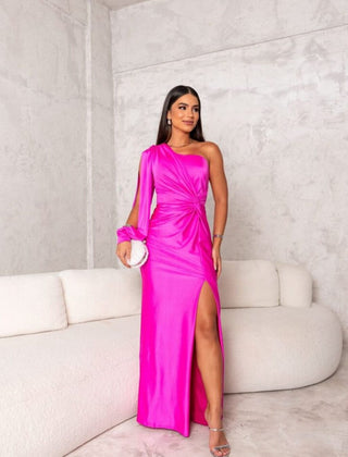 Turquoise Riley one-shoulder evening maxi dress by THE WHITMORE FAMILY displayed on a model. Elegant formal wear for special occasions.