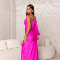 Turquoise Riley one-shoulder evening maxi dress by THE WHITMORE FAMILY, flowing fabric, elegant design for formal occasions.