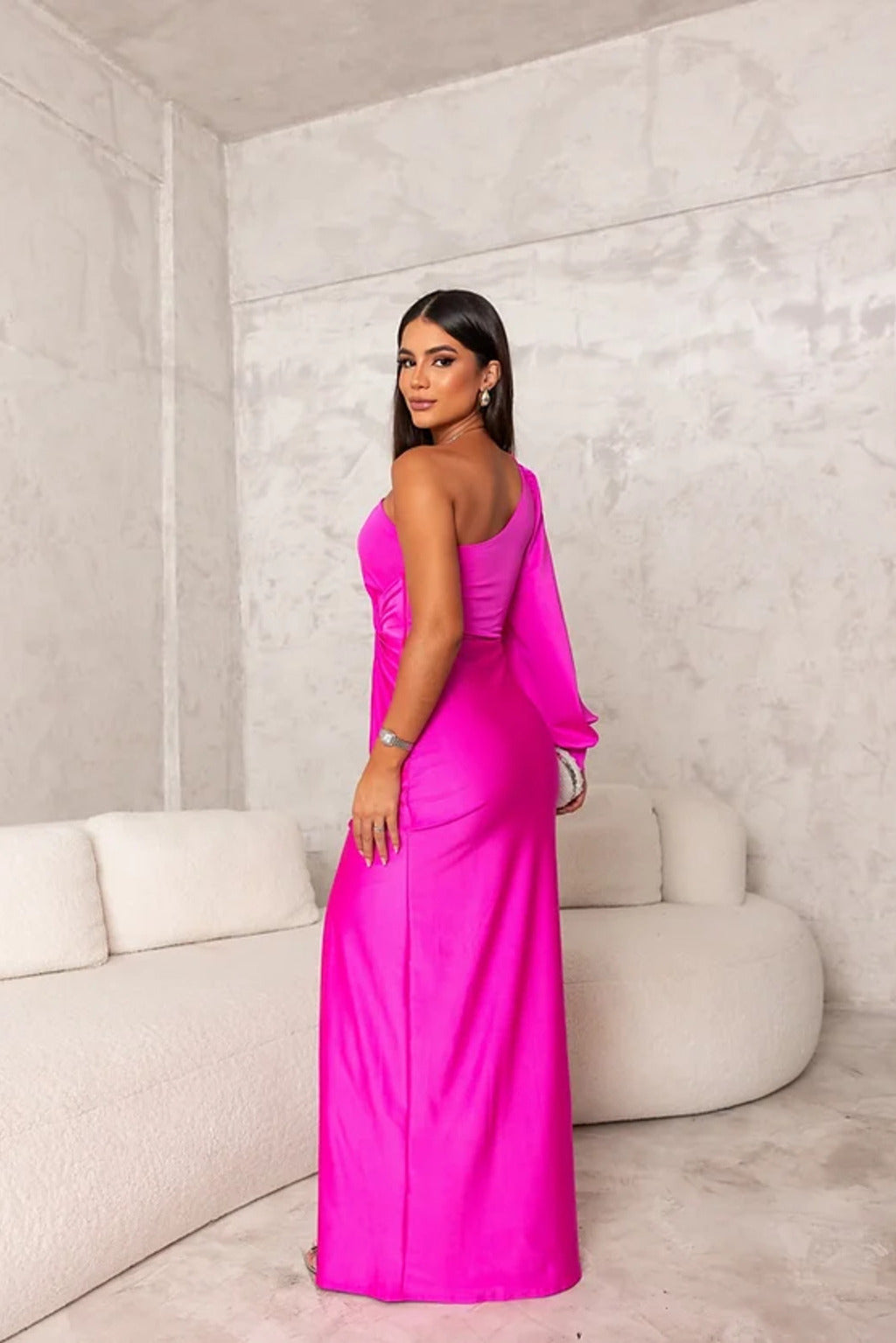 Turquoise Riley one-shoulder evening maxi dress by THE WHITMORE FAMILY, flowing fabric, elegant design for formal occasions.