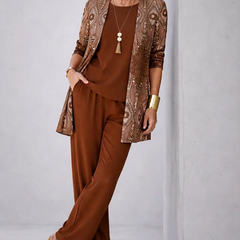 BRIGIT Graceful three-piece trouser set by THE WHITMORE FAMILY, featuring a stylish top, trousers, and matching accessories for women