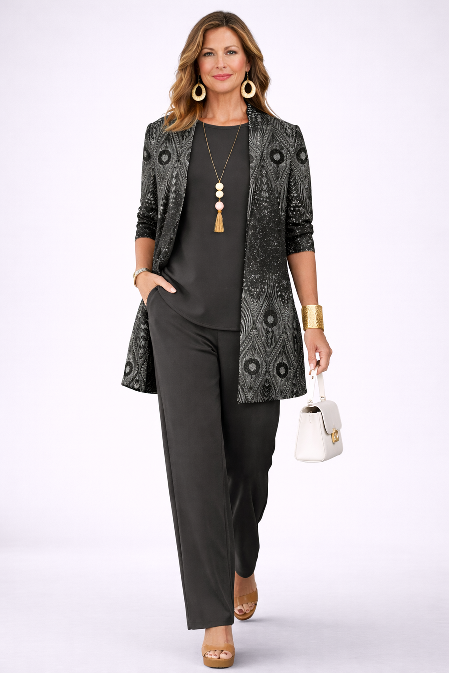 Classic three-piece trouser set from THE WHITMORE FAMILY featuring tailored trousers, a matching blazer, and a stylish shirt.