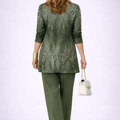 Refined three-piece trouser set by THE WHITMORE FAMILY featuring tailored pants, a matching blazer, and a stylish blouse.