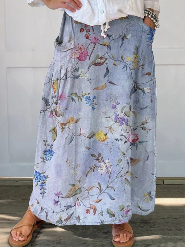 Elegant vintage blue print pocket skirt by THE WHITMORE FAMILY, featuring a classic design and comfortable fit.
