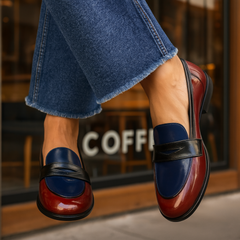 White Flixie Elegant Loafers by THE WHITMORE FAMILY, stylish leather slip-on shoes for women with a sleek design.