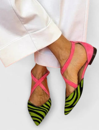 Elegant white ballerina shoe with straps from THE WHITMORE FAMILY's Grace collection, featuring a sleek, stylish design.