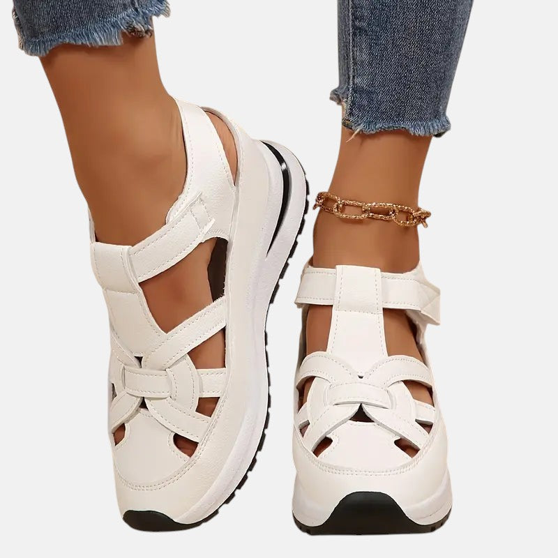 White Aveta™ orthopedic sandals by THE WHITMORE FAMILY with cushioned footbed and supportive design for comfortable wear.