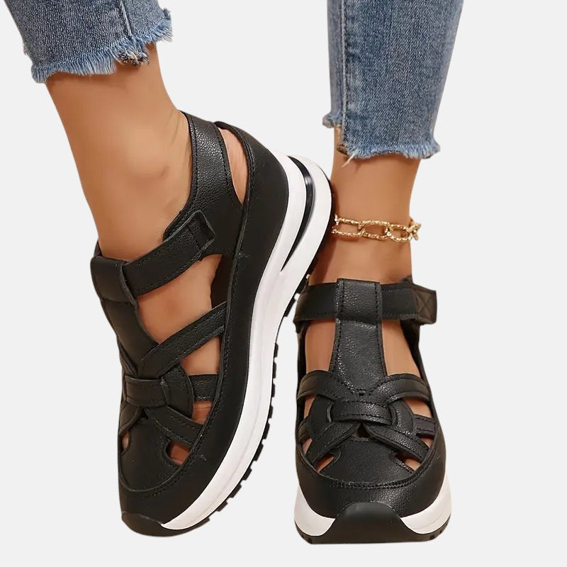 White Aveta™ orthopedic sandals by THE WHITMORE FAMILY featuring supportive straps and cushioned soles.