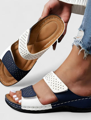 White Karyssa™ orthopedic sandals by THE WHITMORE FAMILY with cushioned soles and supportive straps for comfortable wear.