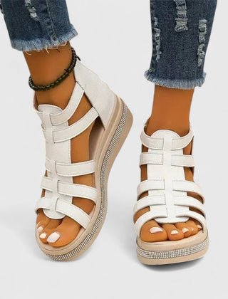 White Kendall™ orthopedic strass sandals with decorative rhinestones and adjustable straps, designed for comfort and style.