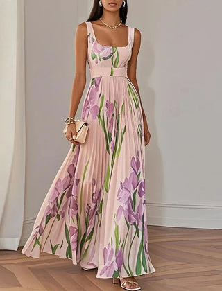 White and blue floral A-line maxi dress by THE WHITMORE FAMILY, featuring a flowing silhouette and elegant design.