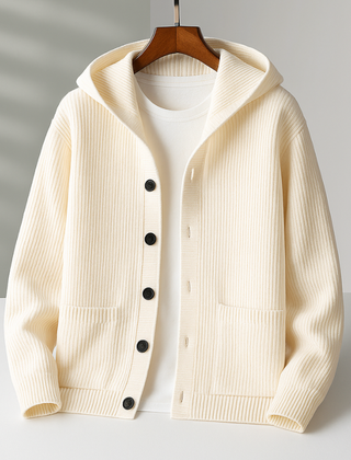 White Ramsay™ Modern Cardigan by THE WHITMORE FAMILY displayed on a hanger, showcasing its sleek, contemporary design and soft fabric.