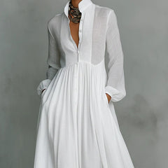 White Barbara maxi dress by THE WHITMORE FAMILY featuring a flowing design and button-front style.