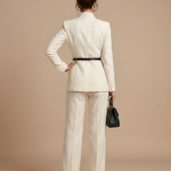White Delta structured stand collar tailored suit by THE WHITMORE FAMILY, featuring a sleek, modern design and tailored fit.