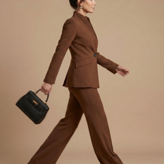 White Delta structured stand collar tailored suit by THE WHITMORE FAMILY, featuring a sleek design and precise tailoring.