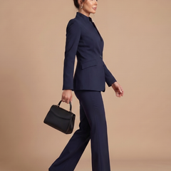 White Delta structured stand collar tailored suit by THE WHITMORE FAMILY, featuring a sleek fit and classic design.