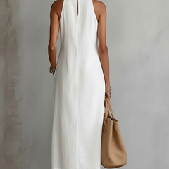 Julie sleeveless lace midi dress by THE WHITMORE FAMILY, white with intricate lace details and a fitted silhouette.