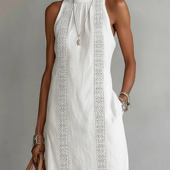 White sleeveless lace detail midi dress by THE WHITMORE FAMILY, Julie style, featuring elegant lace accents and a fitted silhouette.