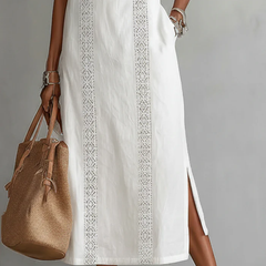 Julie sleeveless lace detail midi dress by THE WHITMORE FAMILY, elegant white dress with intricate lace accents.