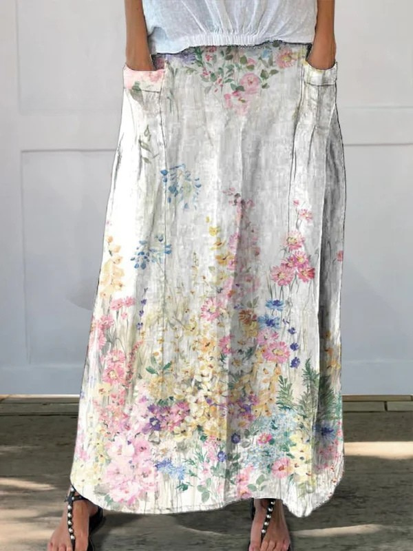 Roxane vintage floral skirt by THE WHITMORE FAMILY with elastic waistband, pockets, and botanical print fabric.