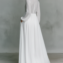White Serena maxi dress by THE WHITMORE FAMILY featuring a flowing silhouette and button-front design.