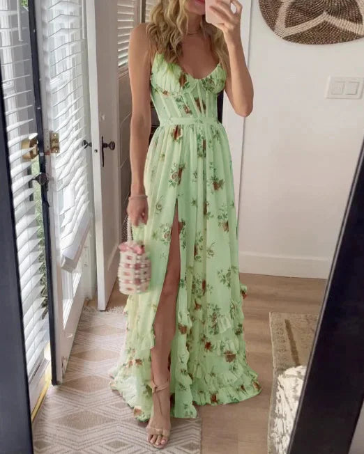 Scarlett Romantic Floral Dress by THE WHITMORE FAMILY, featuring a flowy fabric with a floral print on a white background.