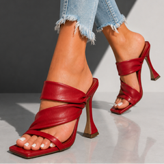 Serena Vale strap heels by The Whitmore Family featuring nude-colored straps and a stylish high heel.