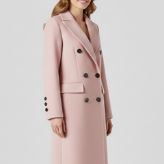 Beige women coat with lapel collar and button closure from THE WHITMORE FAMILY, showcasing a stylish outerwear design.