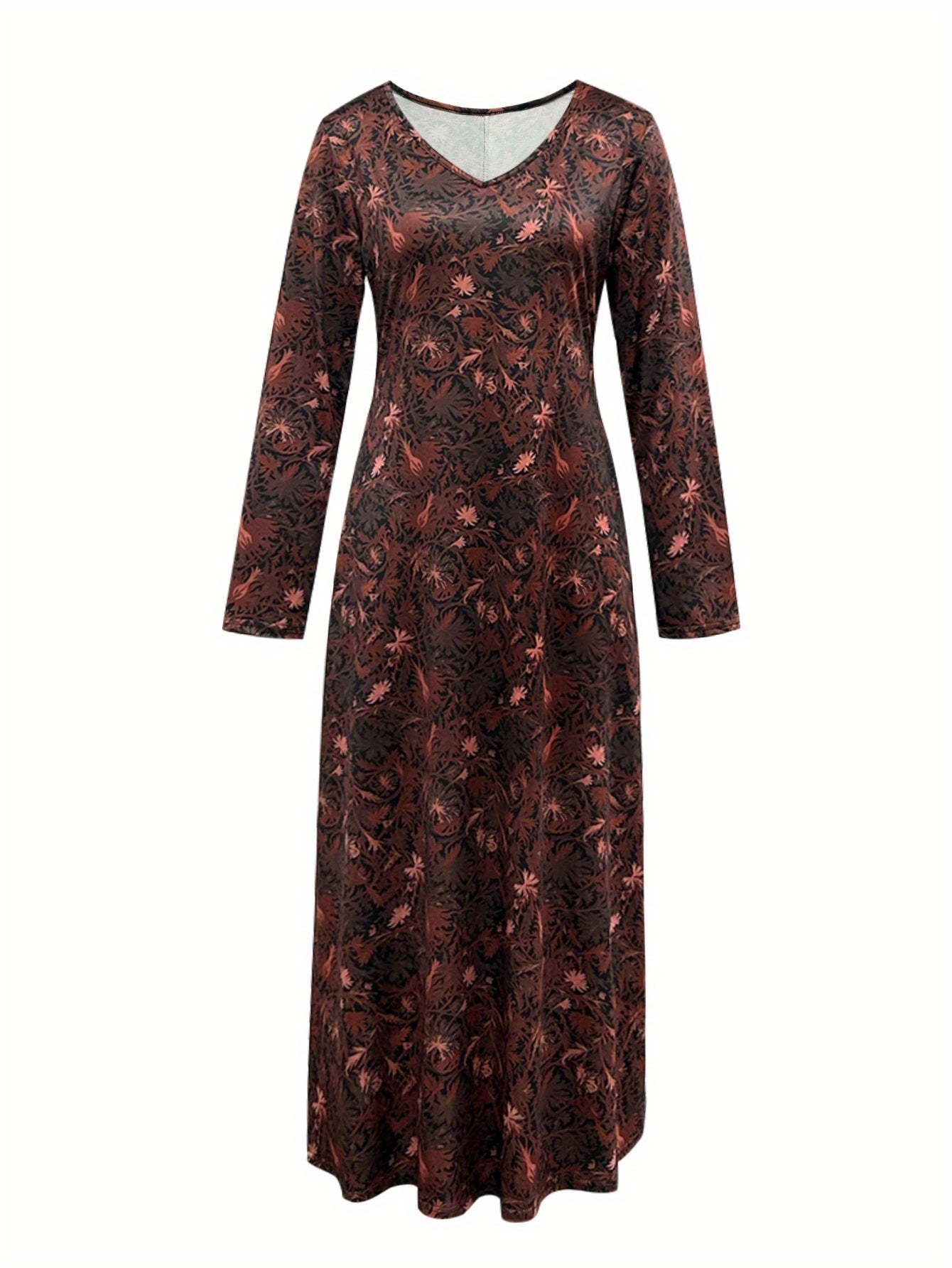 Kendal floral maxi dress for women by THE WHITMORE FAMILY, featuring a colorful floral pattern and flowing fabric.