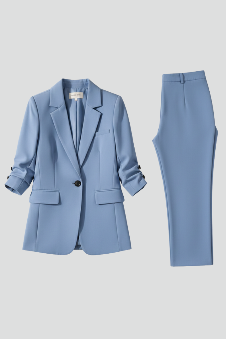 Women’s blazer set with notched lapel and straight-leg trousers, stylish formal outfit by THE WHITMORE FAMILY.