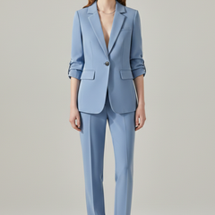 Women’s blazer set with notched lapel and straight-leg trousers, stylish and tailored by THE WHITMORE FAMILY