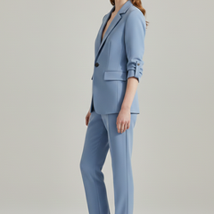 Women’s blazer set with notched lapel and straight-leg trousers, stylish formal wear by THE WHITMORE FAMILY.