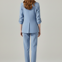 Women’s blazer set with notched lapel and straight-leg trousers, stylish women's clothing by THE WHITMORE FAMILY.
