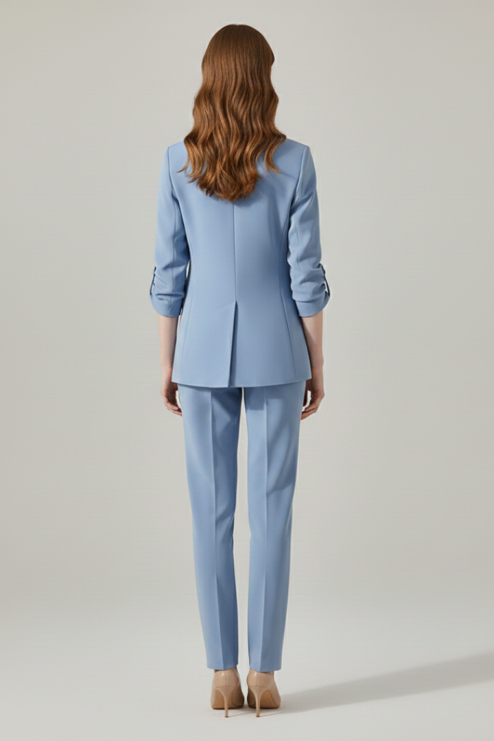 Women’s blazer set with notched lapel and straight-leg trousers, stylish women's clothing by THE WHITMORE FAMILY.
