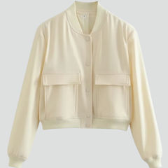 Beige women's bomber jacket with baseball collar and snap buttons, stylish outerwear by THE WHITMORE FAMILY.