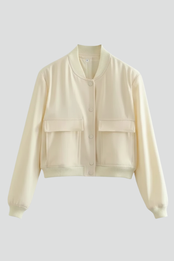 Beige women's bomber jacket with baseball collar and snap buttons, stylish outerwear by THE WHITMORE FAMILY.