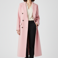 Beige women's coat with lapel collar and button fastening by THE WHITMORE FAMILY, shown hanging on a wooden hanger.