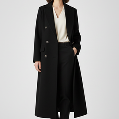 Women's beige coat with lapel collar and button fastening by THE WHITMORE FAMILY, stylish outerwear for fall and winter.