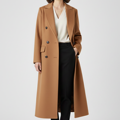 Women’s beige coat with lapel collar and button fastening, stylish outerwear by THE WHITMORE FAMILY.